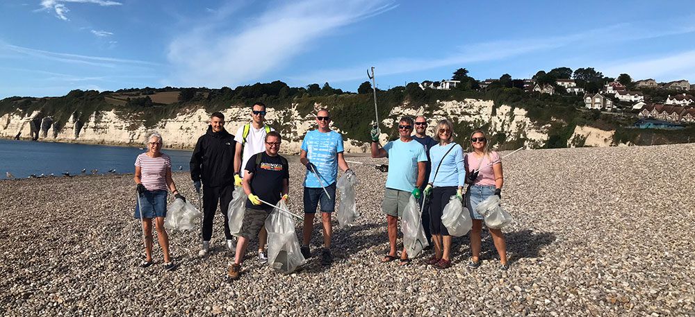 Team Jimmy Green Beach Cleaning